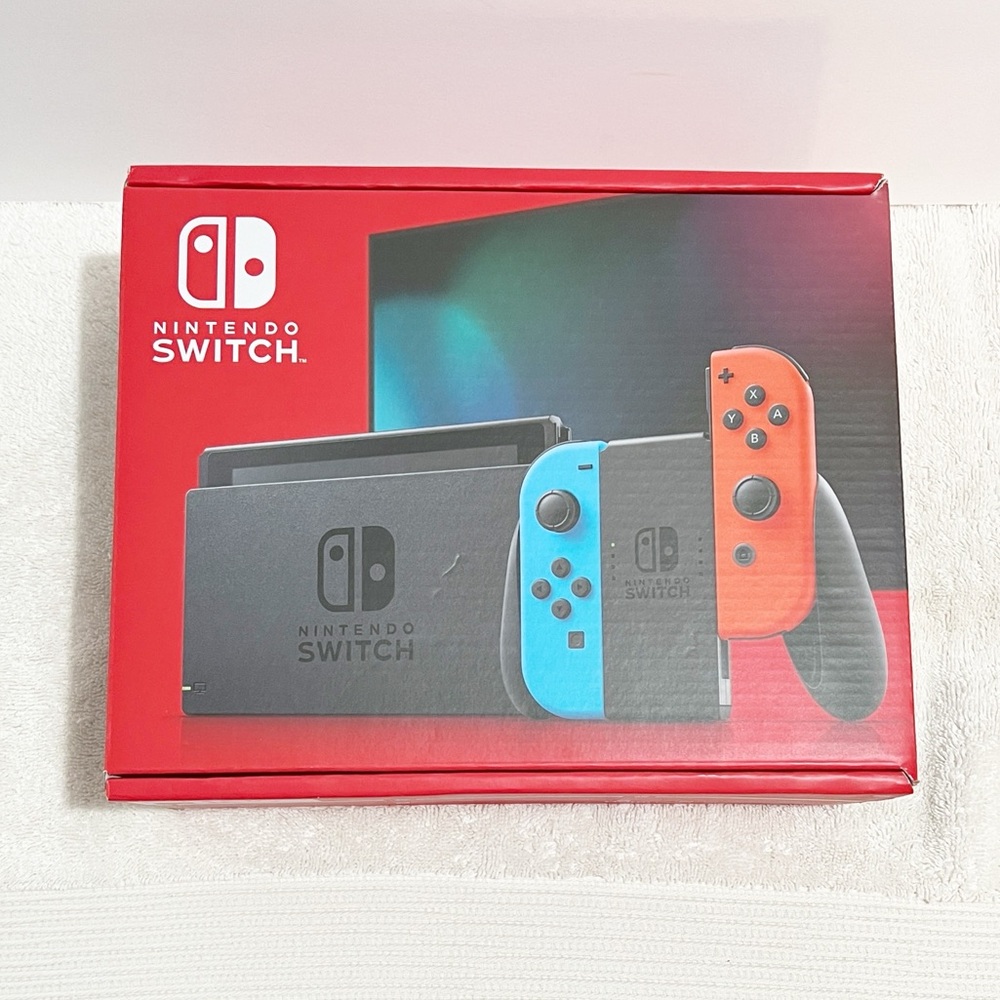 [New In Box] Nintendo Switch w/Neon Blue and Neon Red Joy‑Console